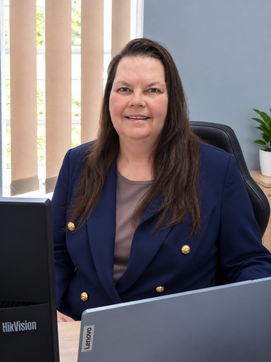 Leeanda Adams at her Secuman office